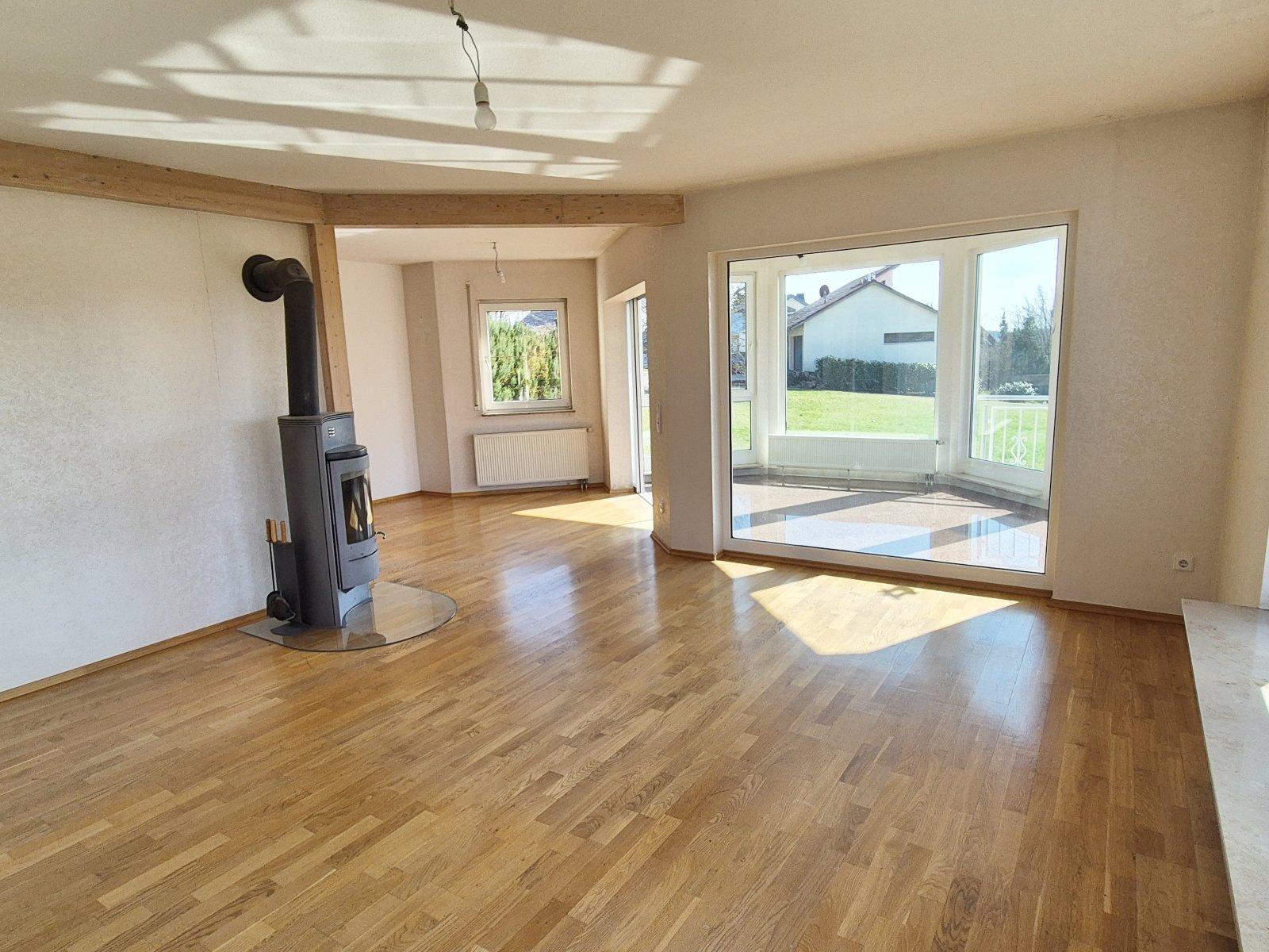Wohnung EG - Wohnzimmer mit Schwedenofen