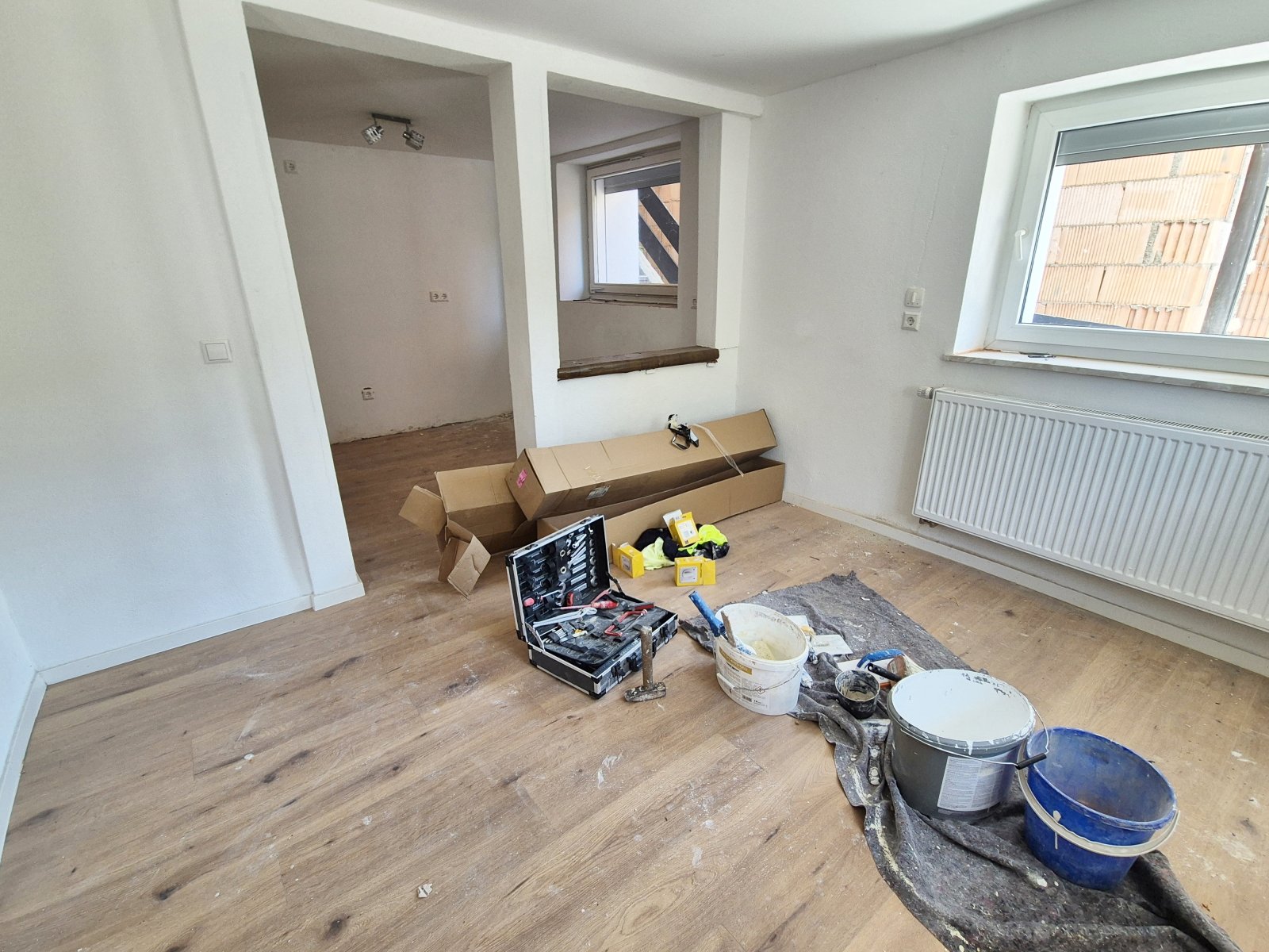 Wohnzimmer mit halb offener Küche EG Wohnzimmer mit halb offener Küche EG