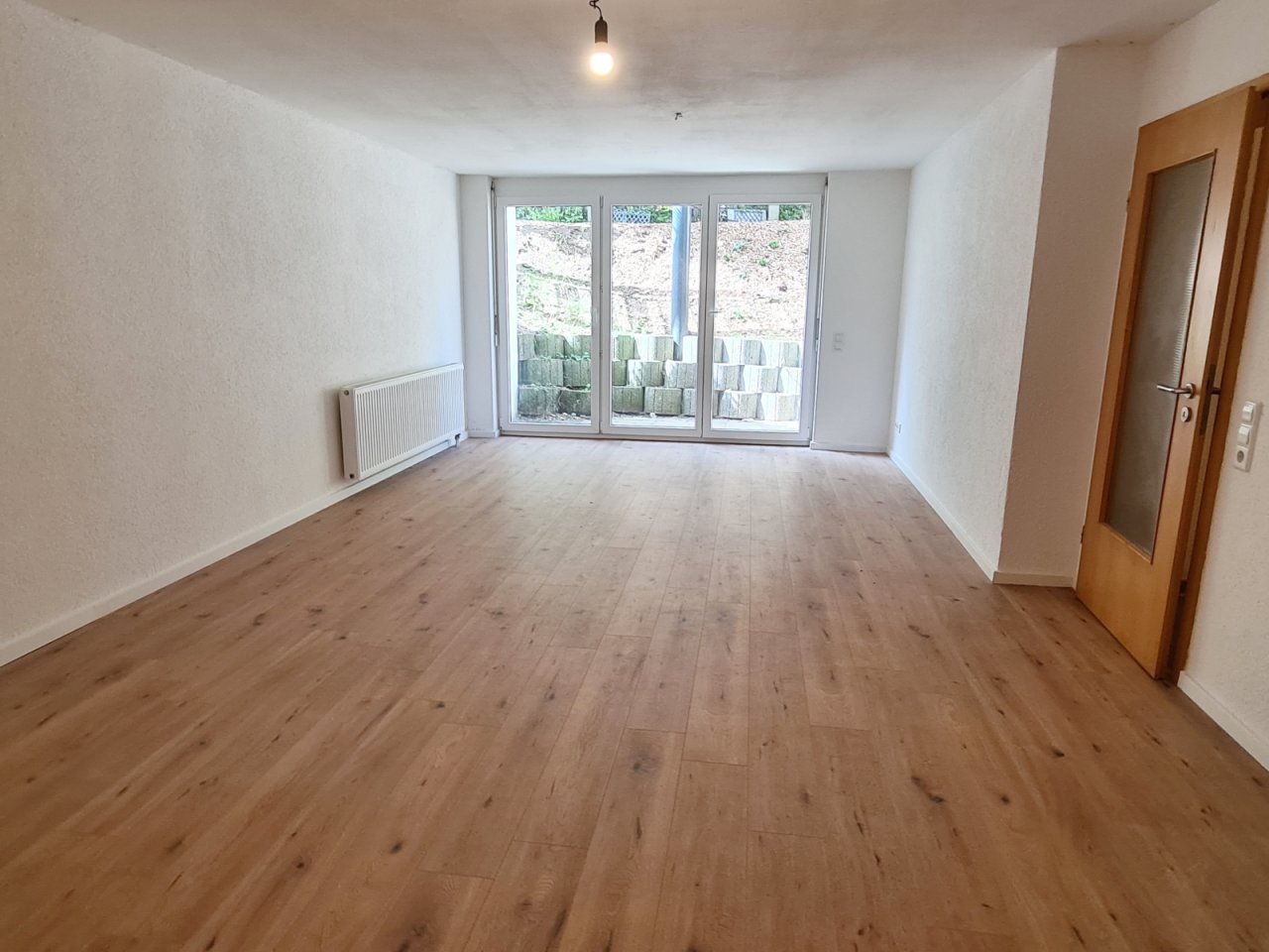 Wohnzimmer mit Zugang Lichthof